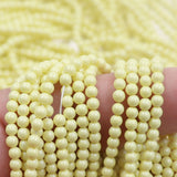high quality crystal glass pearl beads in pastel yellow color