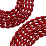 non trace beads in coral red color 4x8mm tear drop shape