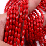 non trace beads in rice 4x8mm coral red color