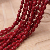 non trace beads tear drop shape 6x9mm in coral red color