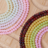 Floral glass beads in jade effect in 4mm