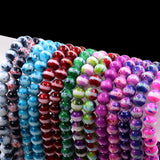 Glass beads with white stripe
