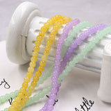Floral glass beads in jade effect in 4mm