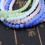 Floral glass beads in jade effect in 4mm