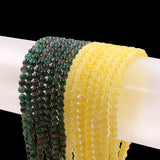 Floral glass beads in jade effect in 4mm
