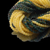 Floral glass beads in jade effect in 4mm
