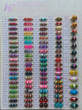 Glass beads with white stripe